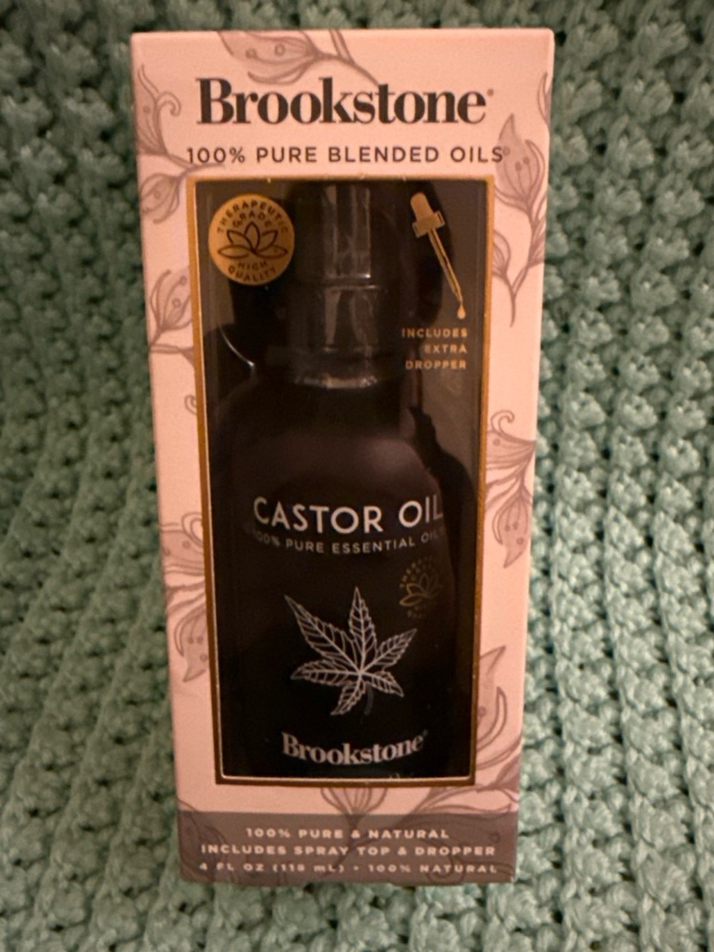 Brookstone Moisturizing Oil - Black Text on Cream Packaging